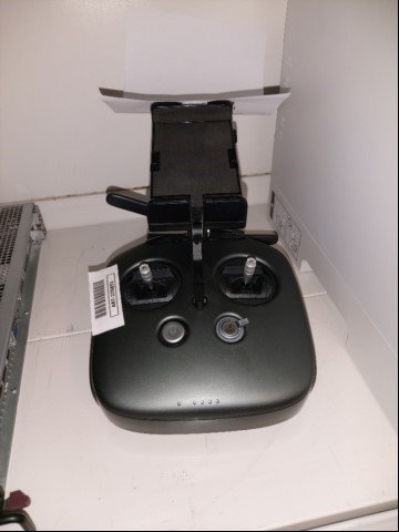 Remote Controller Dji GL858A, comprensivo di
channel expansion kit GL858-EXT; privo di caricabatterie. Testata accensione. (ID=U01-00)